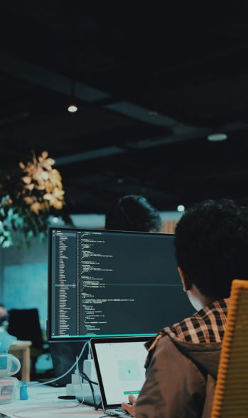 boy in front of computer monitor